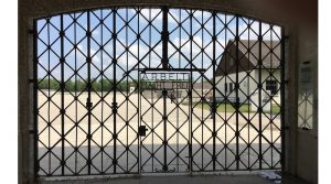 Gates inscribed with Arbeit Macht Frei